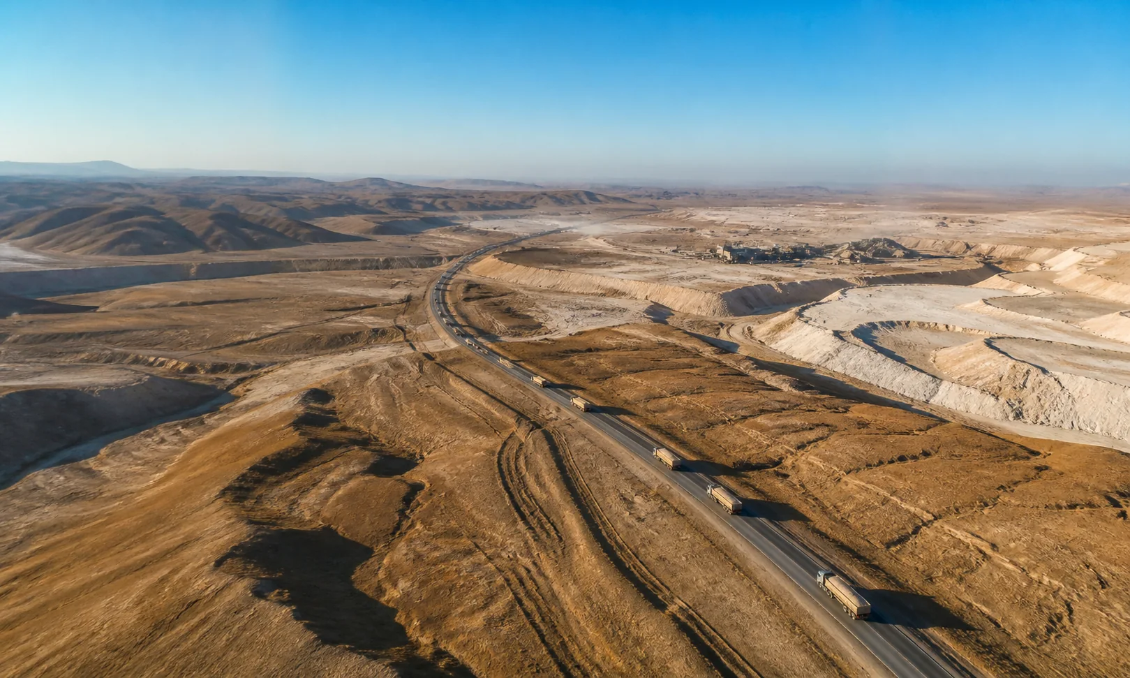 Phosphate trucks crossing the Syrian landscape from Khunayfis